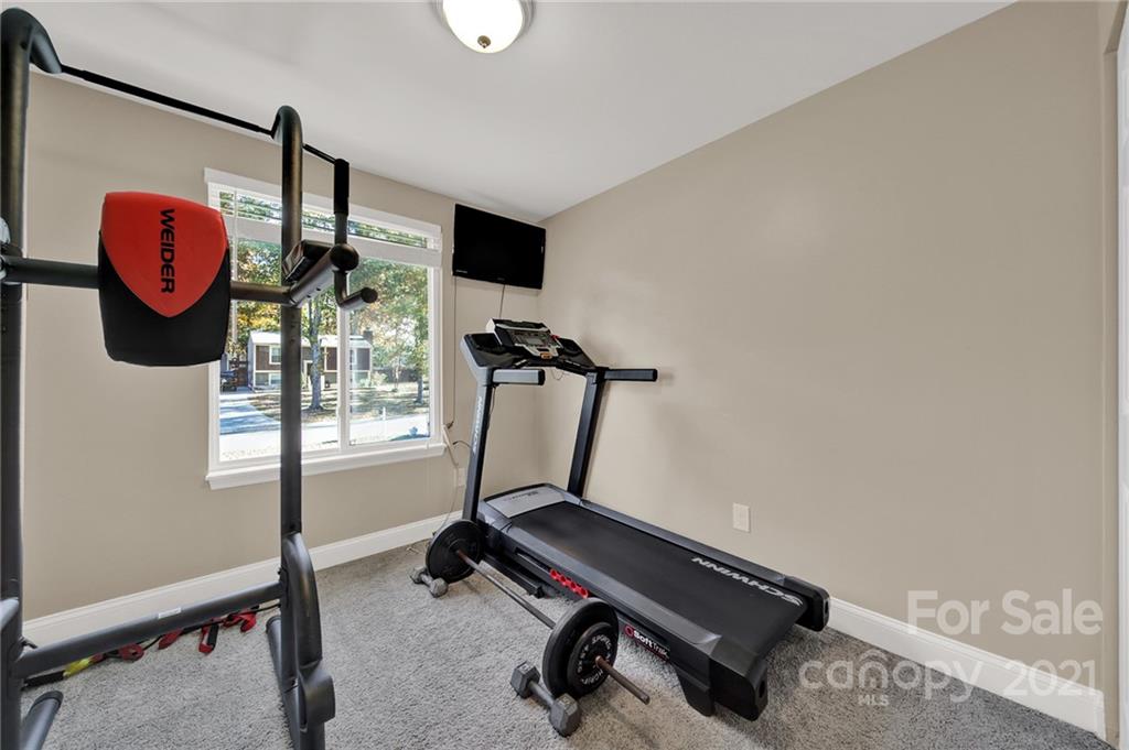 2430 Rice Planters Road Charlotte, NC 28273 - Photo 21 of 42 a room with gym equipment