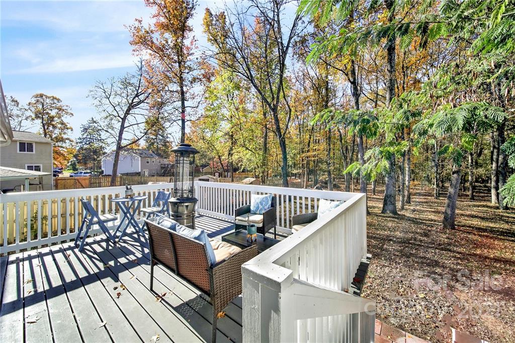 2430 Rice Planters Road Charlotte, NC 28273 - Photo 28 of 42 a view of balcony with wooden floor and outdoor seating