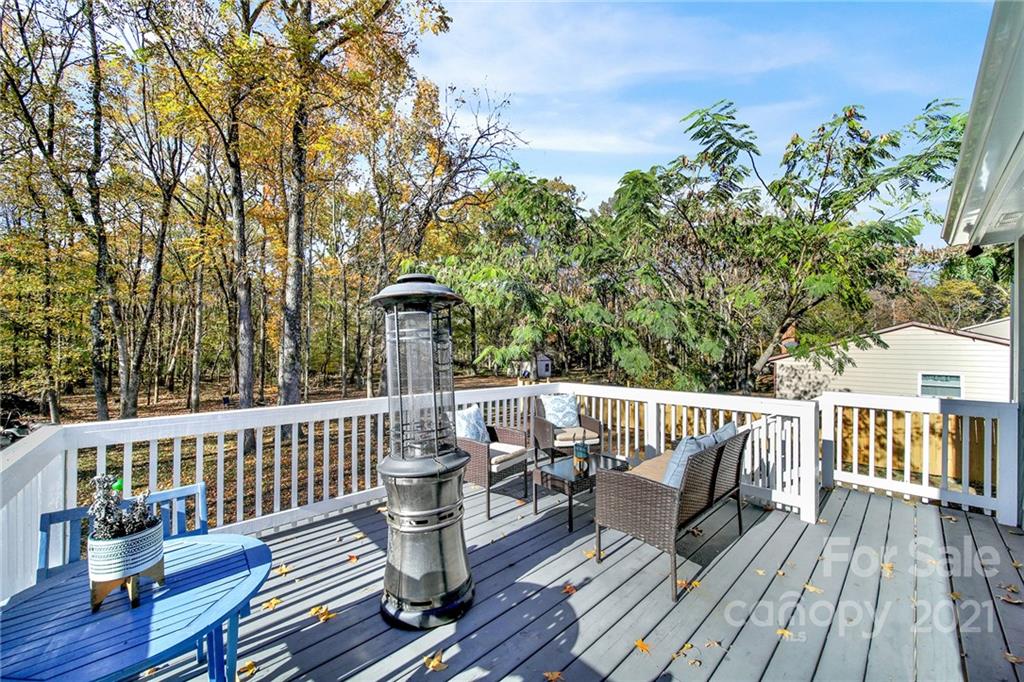 2430 Rice Planters Road Charlotte, NC 28273 - Photo 29 of 42 a view of a deck with furniture and wooden floor