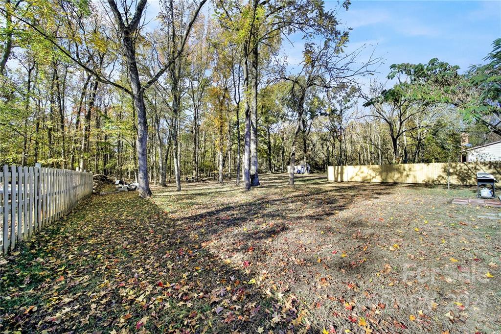 2430 Rice Planters Road Charlotte, NC 28273 - Photo 36 of 42 a view of outdoor space with trees