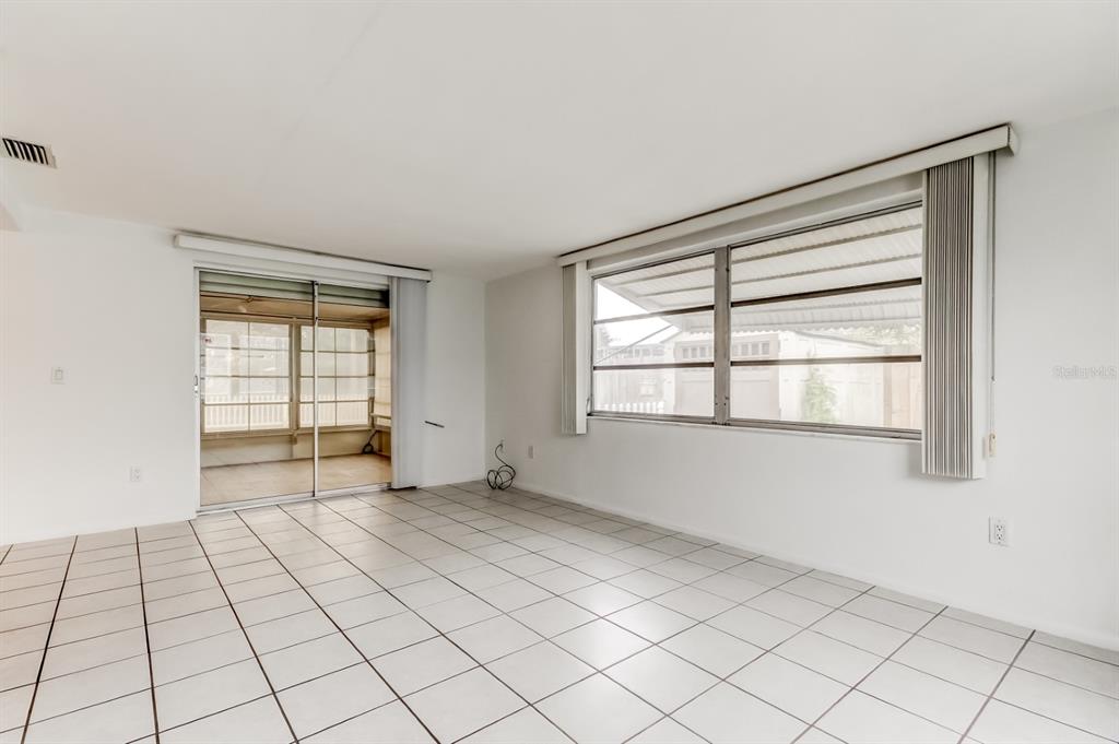 3735 Mynabird Drive New Port Richey, FL 34652 - Photo 28 of 51 a view of an empty room with a window