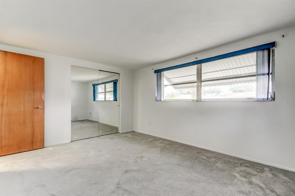 3735 Mynabird Drive New Port Richey, FL 34652 - Photo 36 of 51 an empty room with windows
