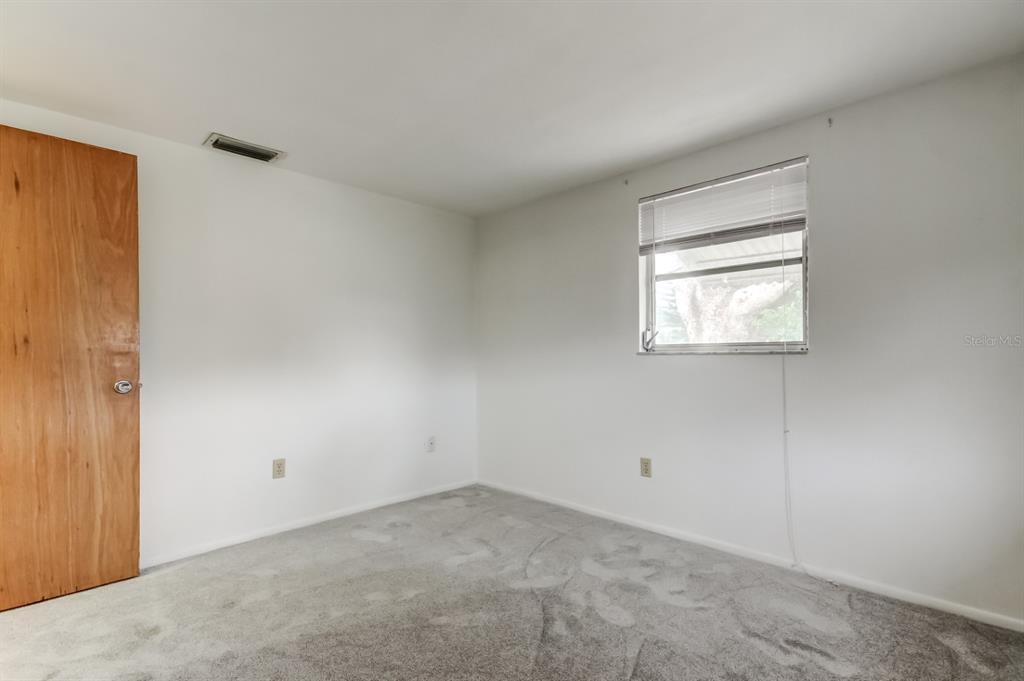 3735 Mynabird Drive New Port Richey, FL 34652 - Photo 42 of 51 an empty room with windows