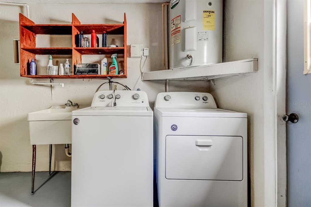 3735 Mynabird Drive New Port Richey, FL 34652 - Photo 43 of 51 a utility room with dryer and washer