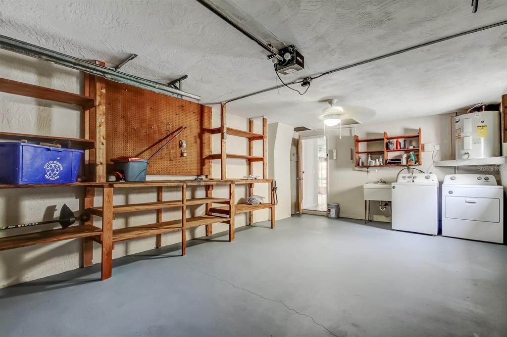 3735 Mynabird Drive New Port Richey, FL 34652 - Photo 44 of 51 a storage room with washer and dryer