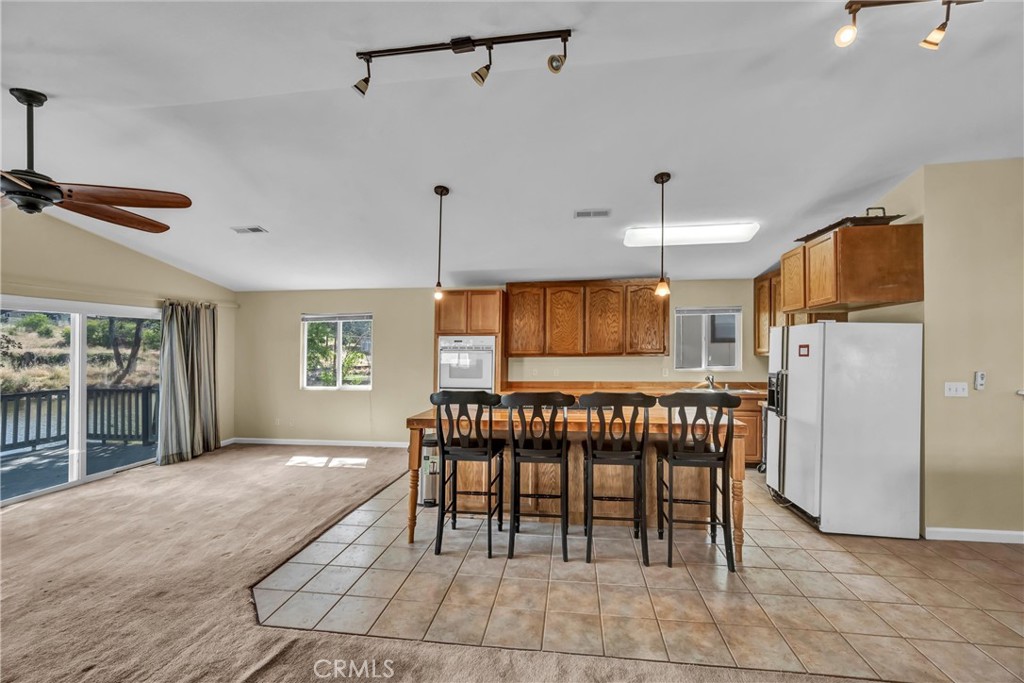 16410 Tish-A-Tang Road Lower Lake, CA 95457 - Photo 12 of 52 a view of kitchen with furniture stove and refrigerator