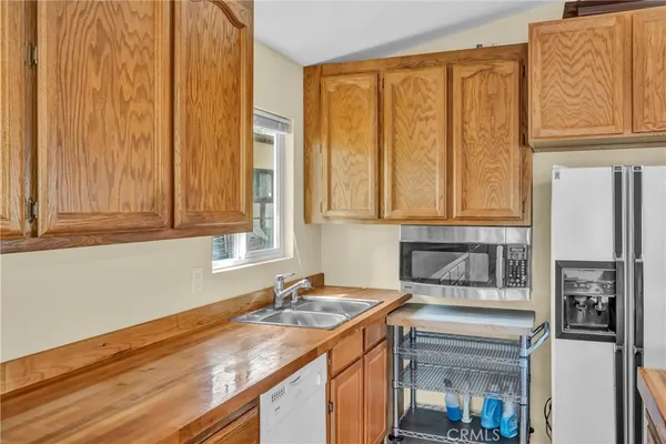 a bathroom with a sink and a window