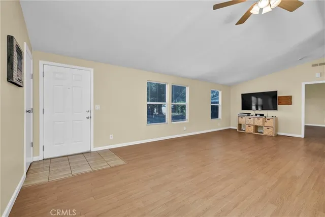 a view of livingroom with furniture and flat screen tv