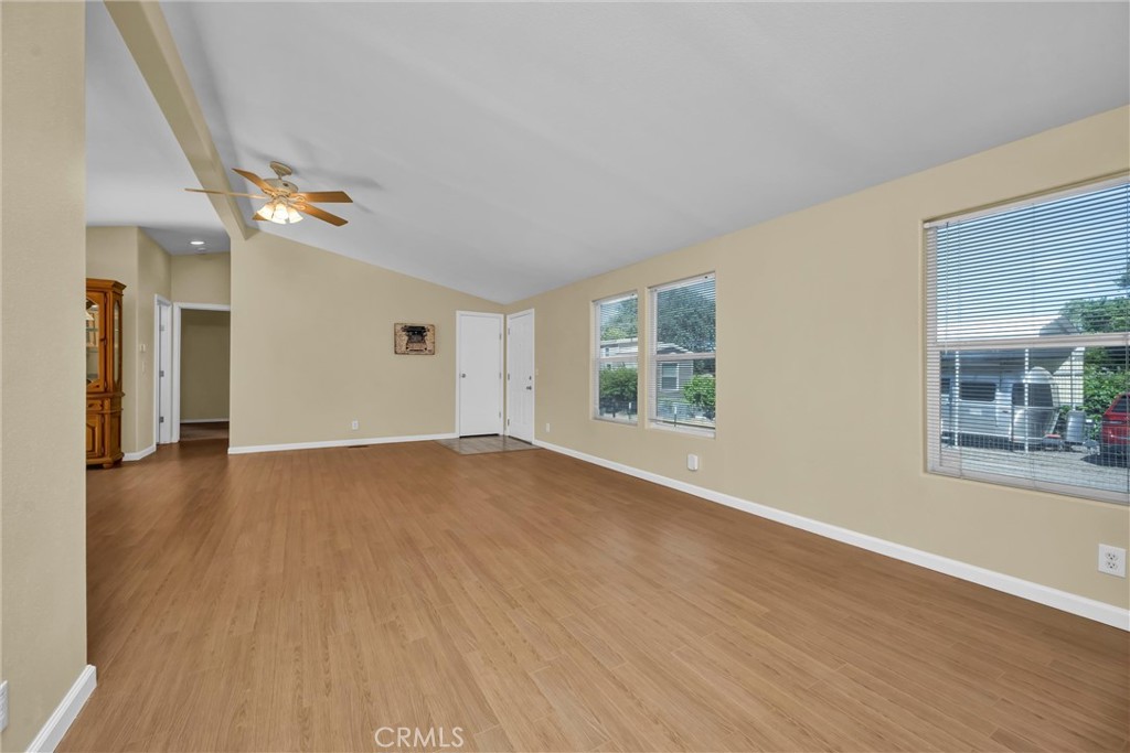 16410 Tish-A-Tang Road Lower Lake, CA 95457 - Photo 40 of 52 an empty room with wooden floor and windows