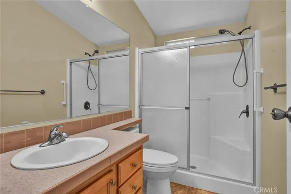 a view of room with window and ceiling fan