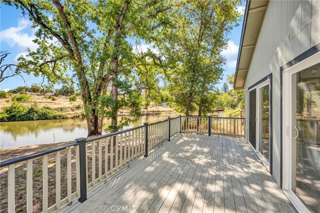 16410 Tish-A-Tang Road Lower Lake, CA 95457 - Photo 7 of 52 a view of a porch with wooden floor and fence