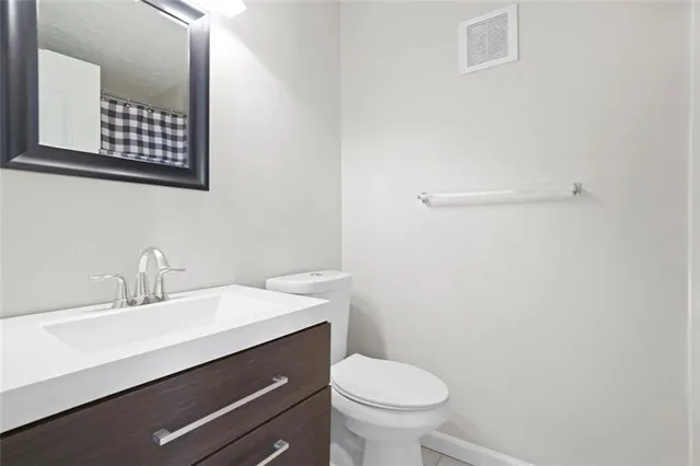 a bathroom with a sink and a toilet