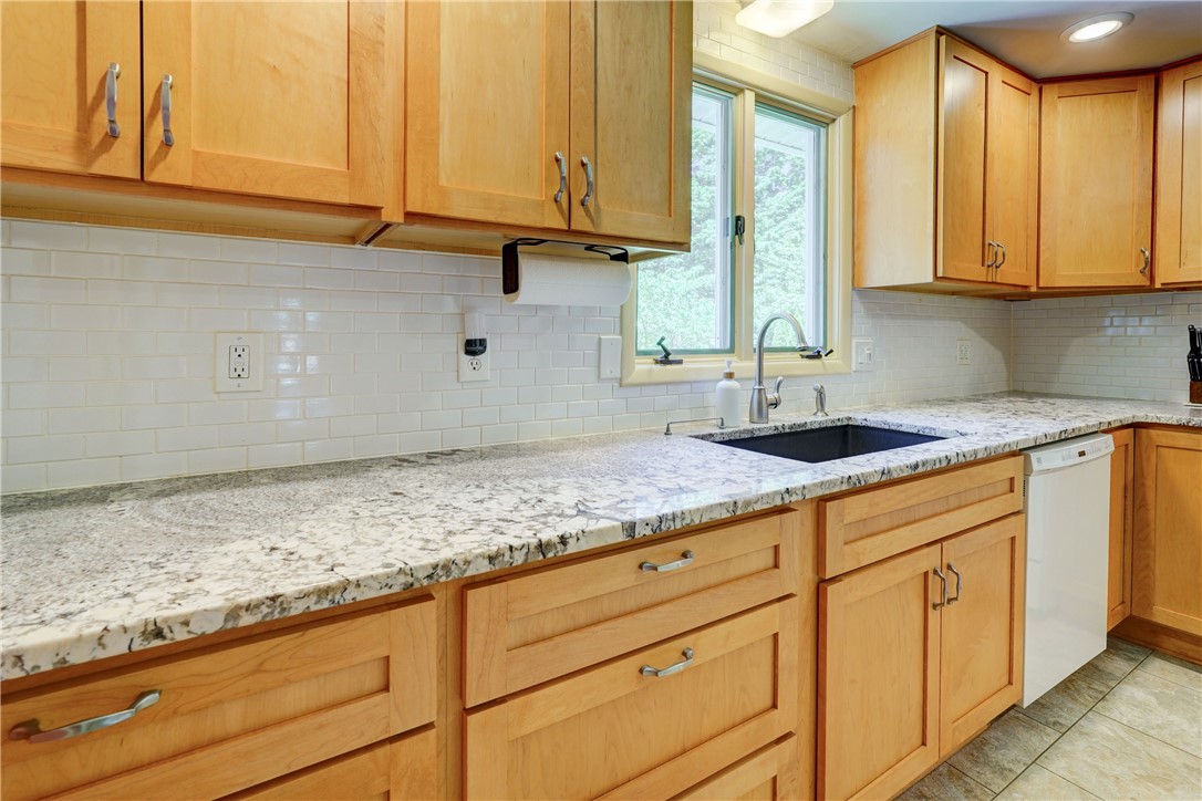 200 Klink Road Brighton, NY 14625 - Photo 7 of 23 kitchen with tile backsplash