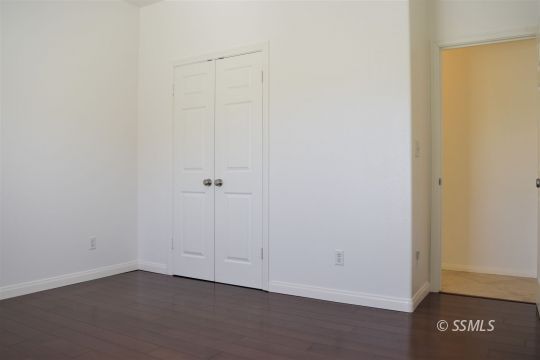 919 Sims Street Ridgecrest, CA 93555 - Photo 11 of 32 an empty room with a door