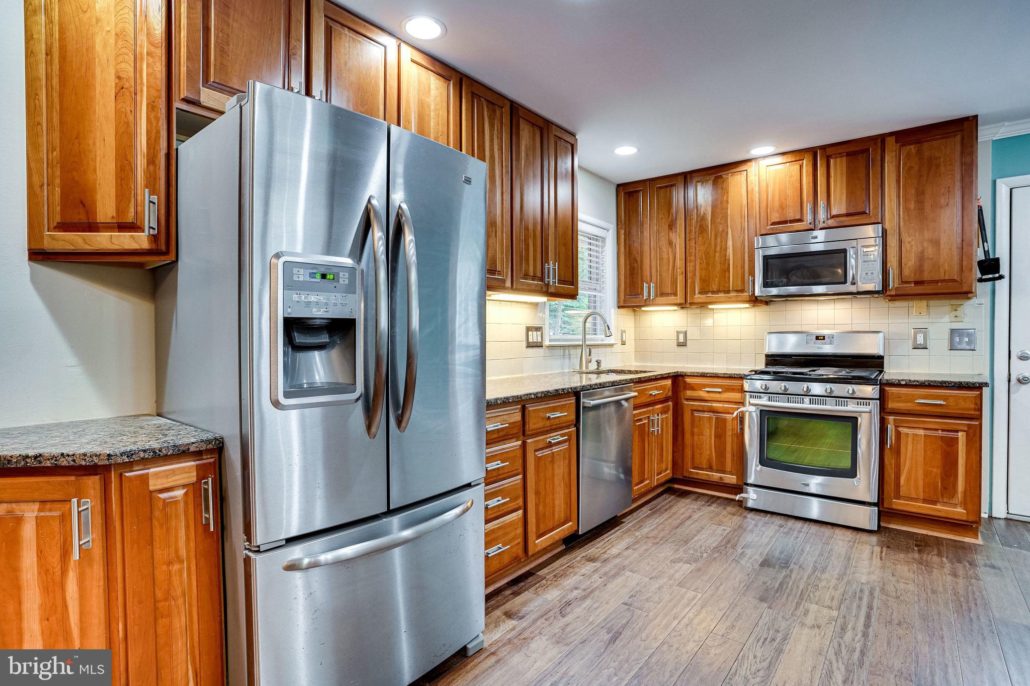 8617 Kerry Lane Springfield, VA 22152 - Photo 17 of 59 Granite Counters and Recessed Lighting