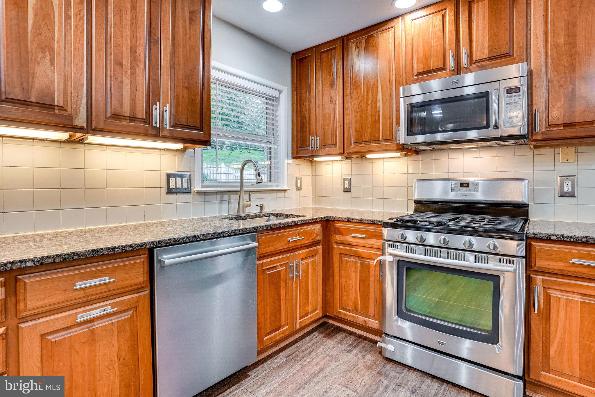 8617 Kerry Lane Springfield, VA 22152 - Photo 20 of 59 Under Cabinet Lighting and Backsplash