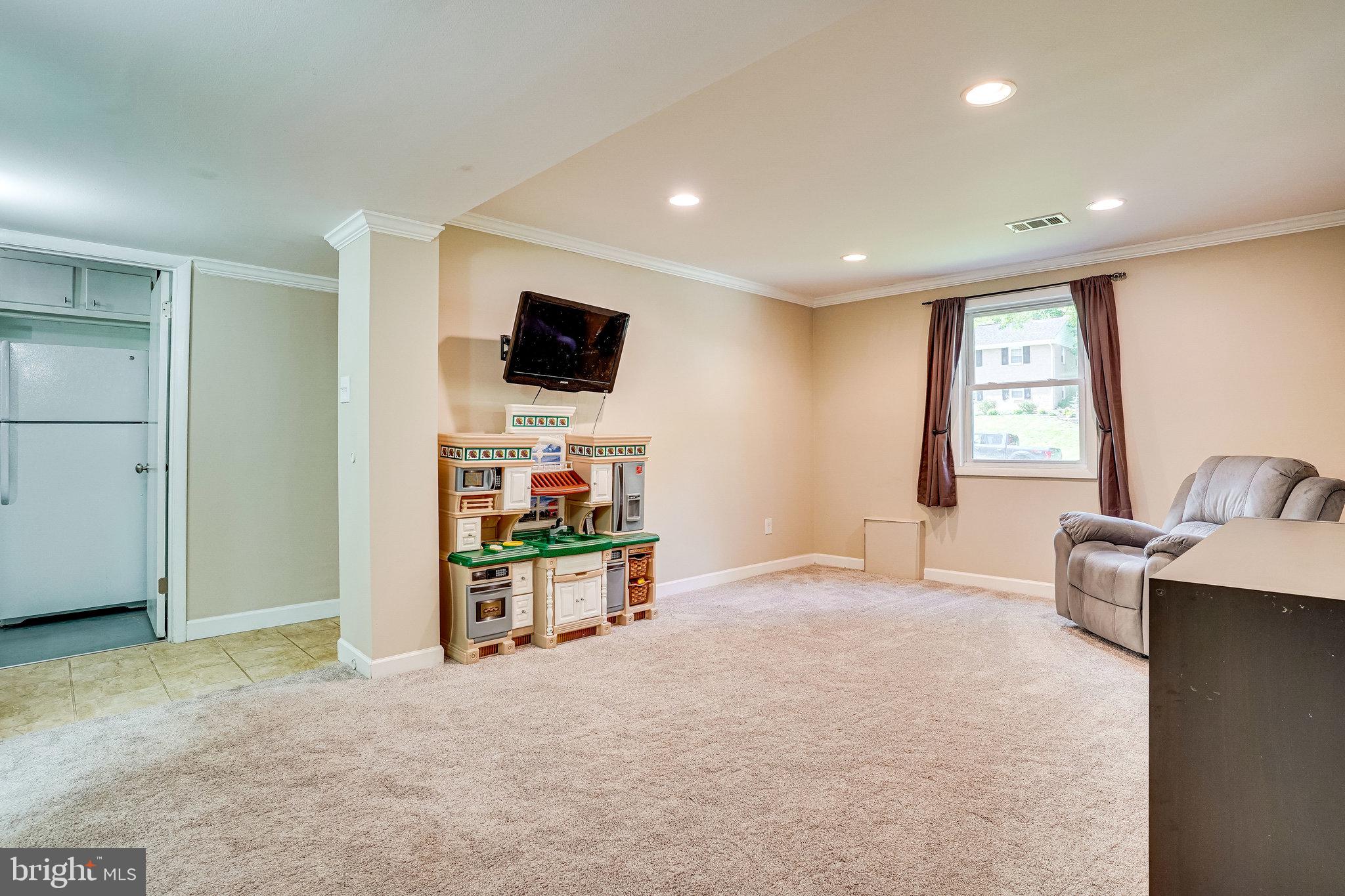 8617 Kerry Lane Springfield, VA 22152 - Photo 41 of 59 Rec Room in Basement with Crown Molding