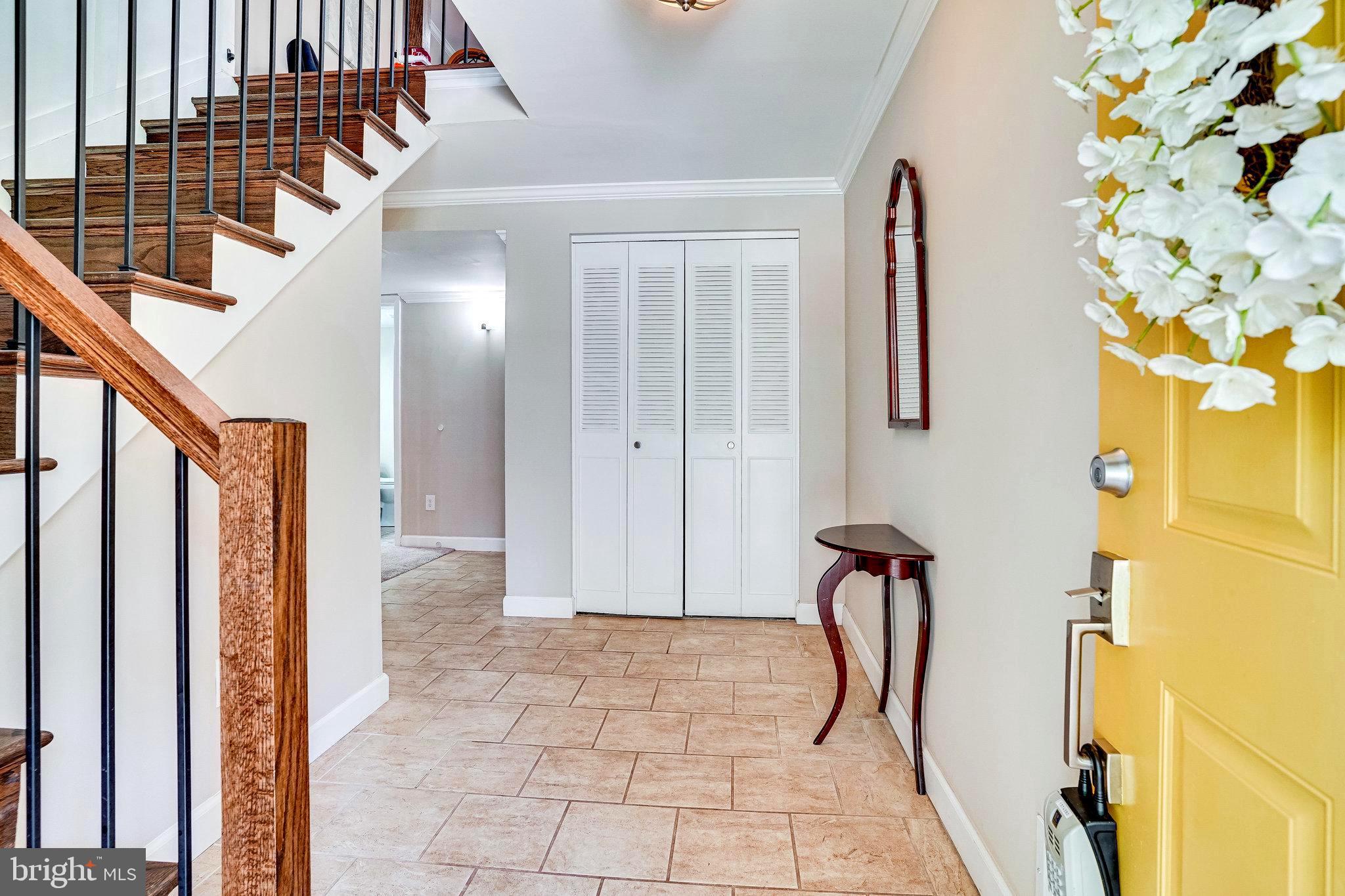Foyer Entrance with Tile Flooring