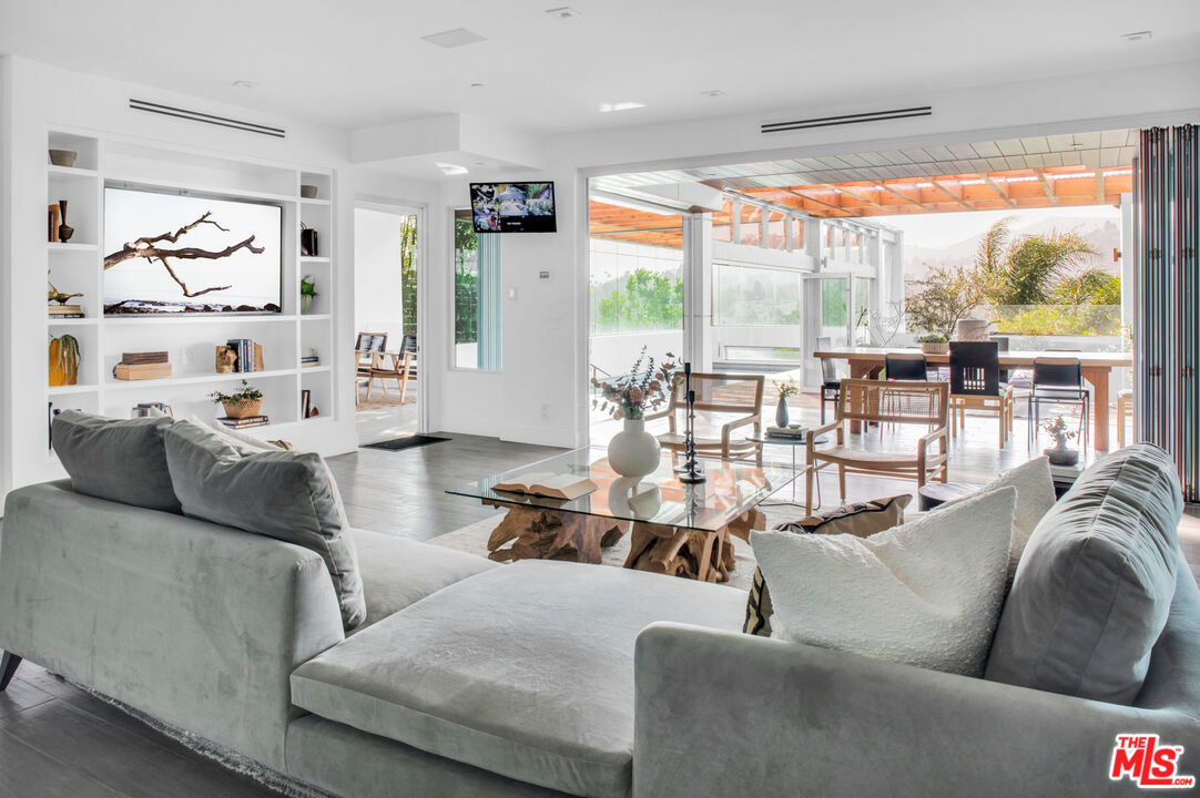 2945 Angus Street Los Angeles, CA 90039 - Photo 13 of 52 a living room with furniture and a large window