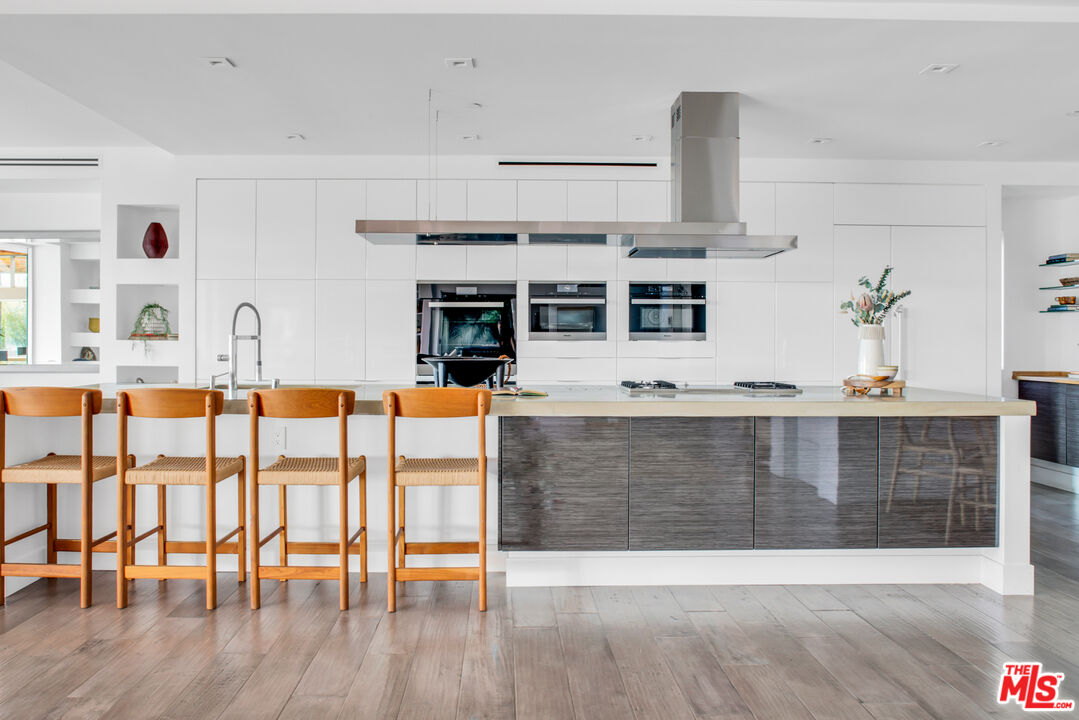 2945 Angus Street Los Angeles, CA 90039 - Photo 14 of 52 a view of kitchen with furniture and wooden floor