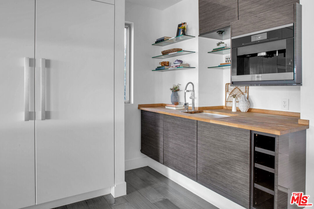 2945 Angus Street Los Angeles, CA 90039 - Photo 17 of 52 a bathroom with a sink and a mirror