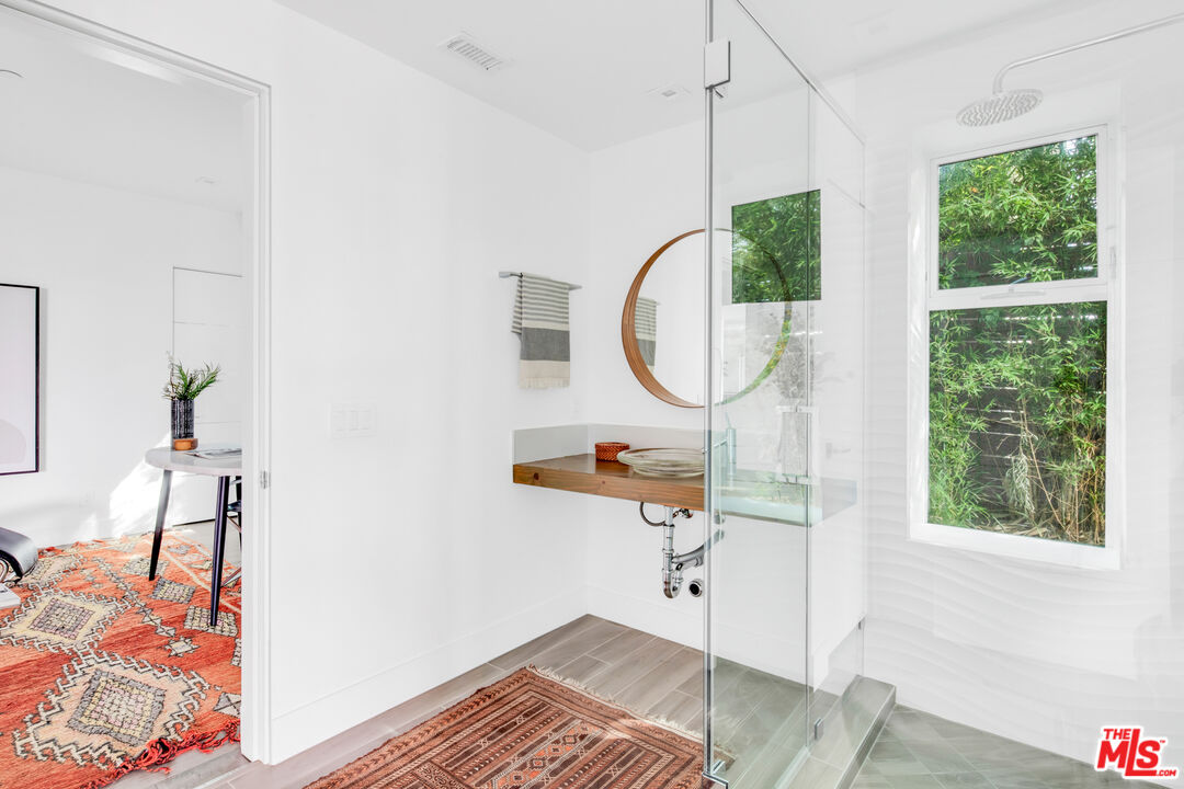 2945 Angus Street Los Angeles, CA 90039 - Photo 19 of 52 a room with window and a chandelier