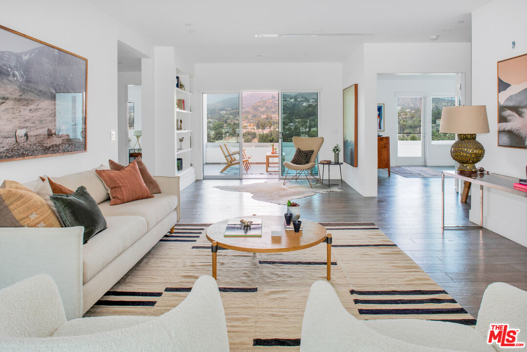 2945 Angus Street Los Angeles, CA 90039 - Photo 21 of 52 a living room with furniture and a table