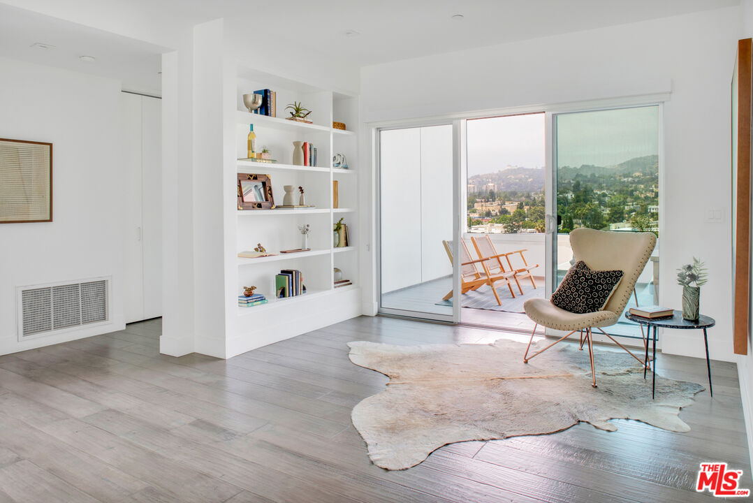 2945 Angus Street Los Angeles, CA 90039 - Photo 22 of 52 a living room with furniture and a large window