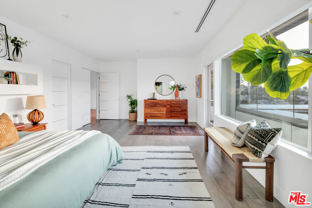 2945 Angus Street Los Angeles, CA 90039 - Photo 27 of 52 a bedroom with a bed and a window