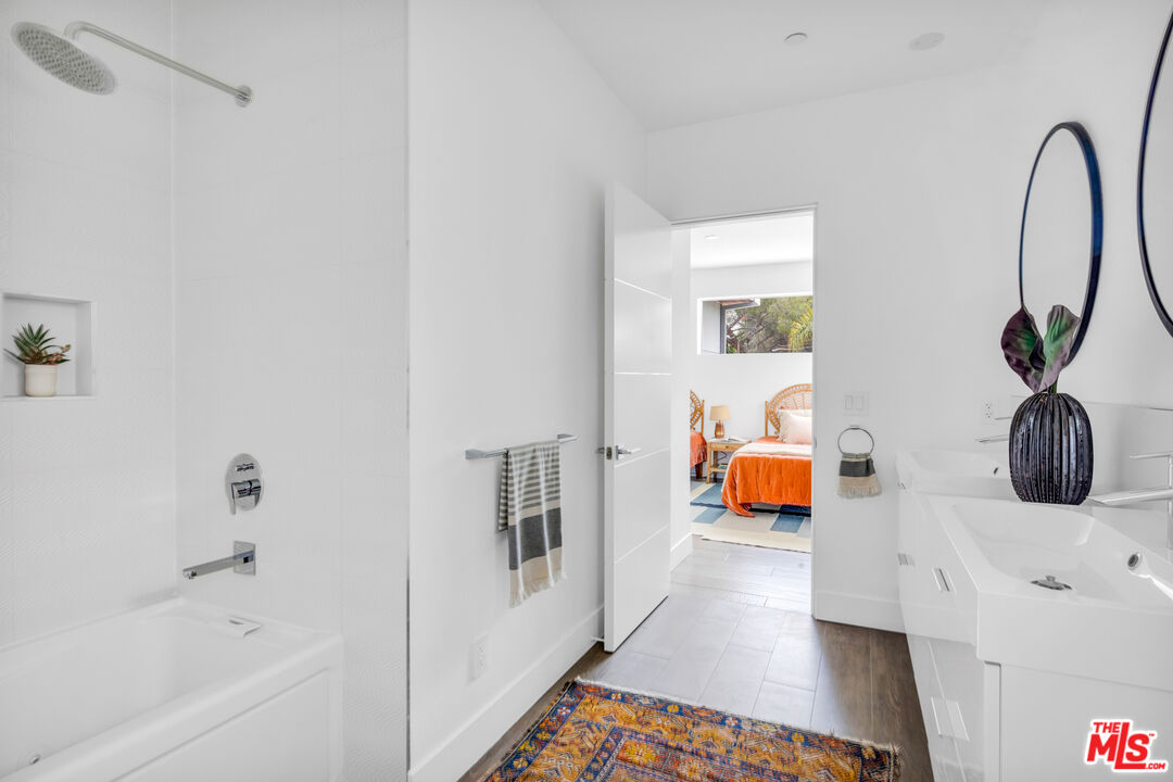 2945 Angus Street Los Angeles, CA 90039 - Photo 31 of 52 a picture of a living room and a bath tub