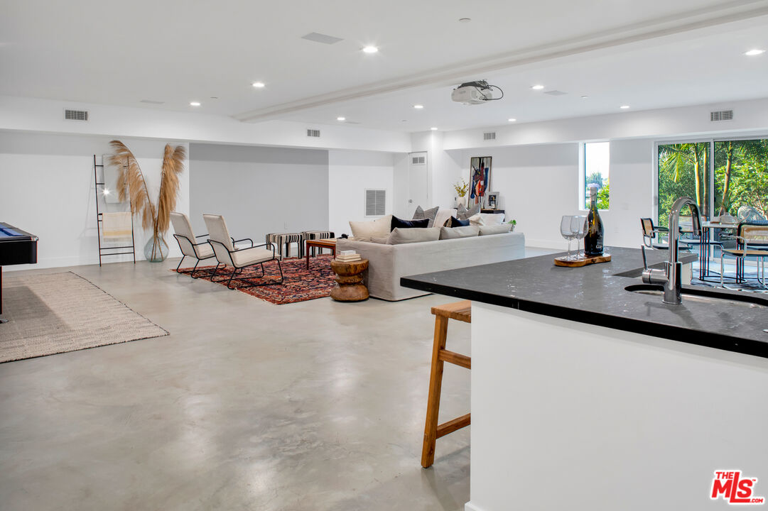 2945 Angus Street Los Angeles, CA 90039 - Photo 35 of 52 a very nice looking living room with kitchen island furniture and a wooden floor