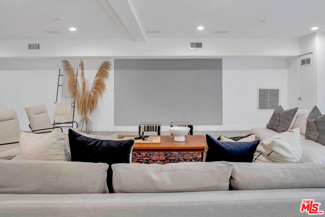 2945 Angus Street Los Angeles, CA 90039 - Photo 37 of 52 a living room with furniture and white walls