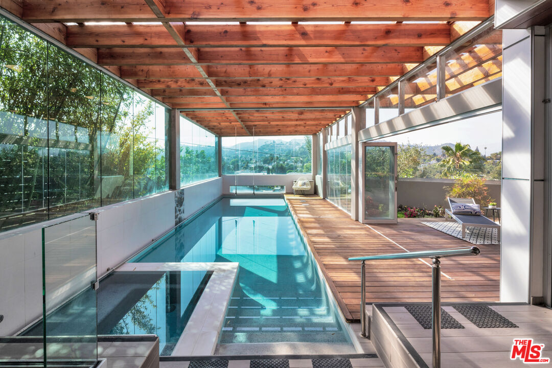 2945 Angus Street Los Angeles, CA 90039 - Photo 41 of 52 a view of a patio with a table and chairs