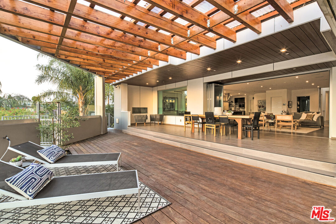2945 Angus Street Los Angeles, CA 90039 - Photo 45 of 52 a living room with lots of furniture and a table