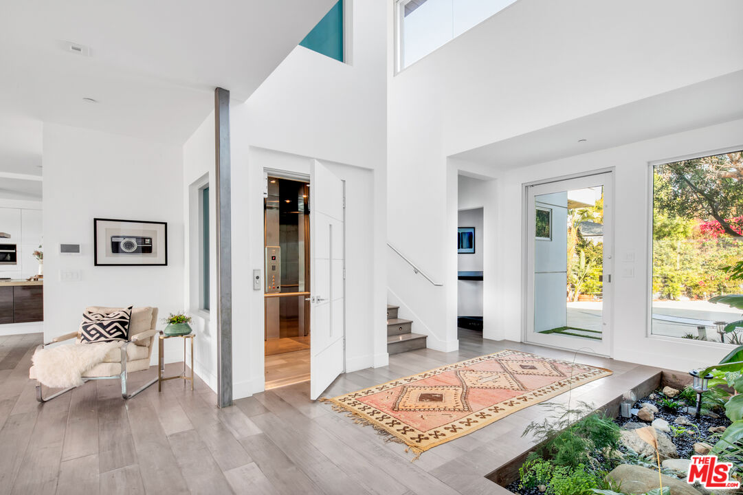 2945 Angus Street Los Angeles, CA 90039 - Photo 6 of 52 a view of livingroom with hardwood floor and hallway