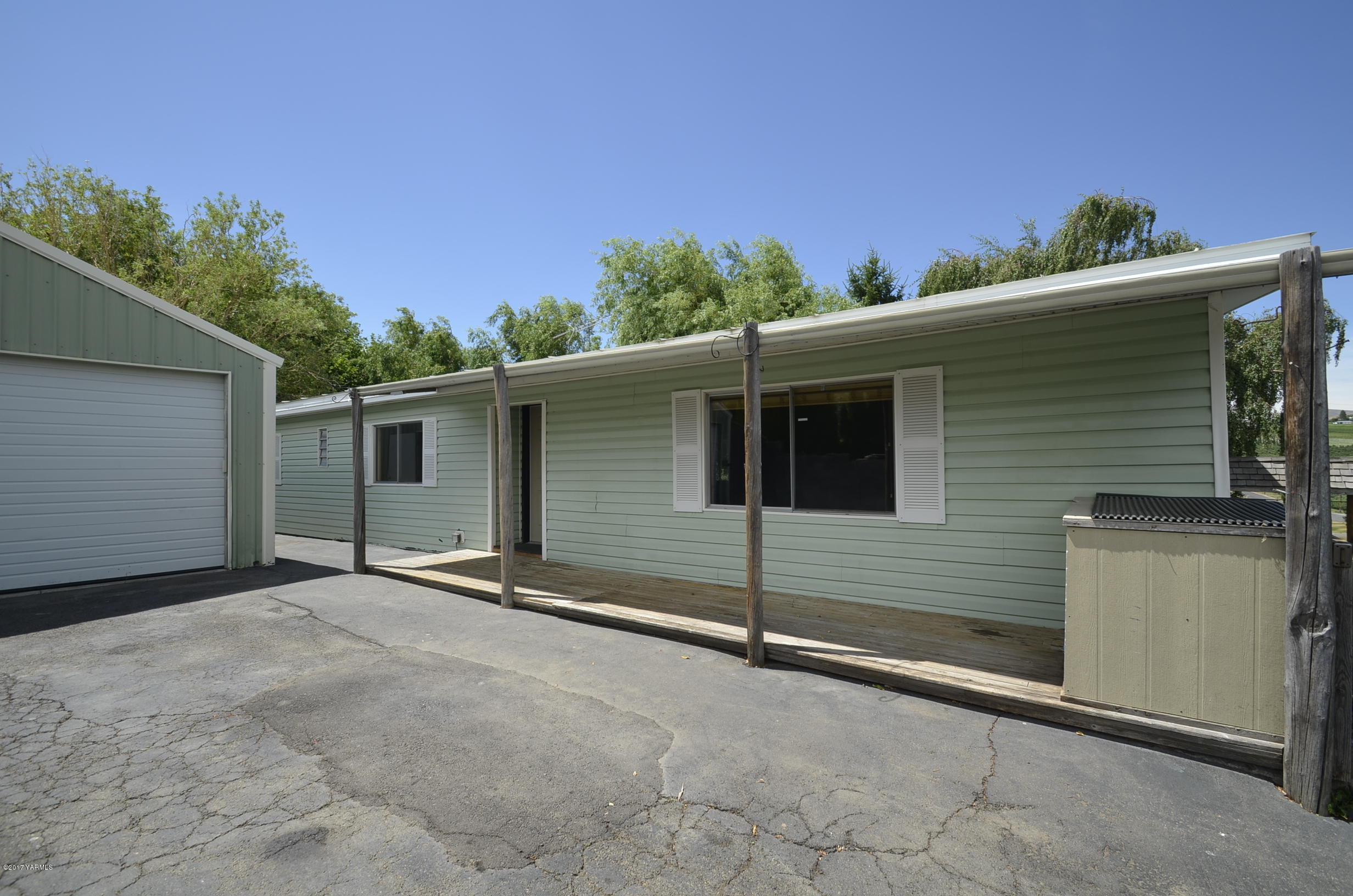 13206 Summitview Ext Road Yakima, WA 98908 - Photo 2 of 29 a view of a house with a garage