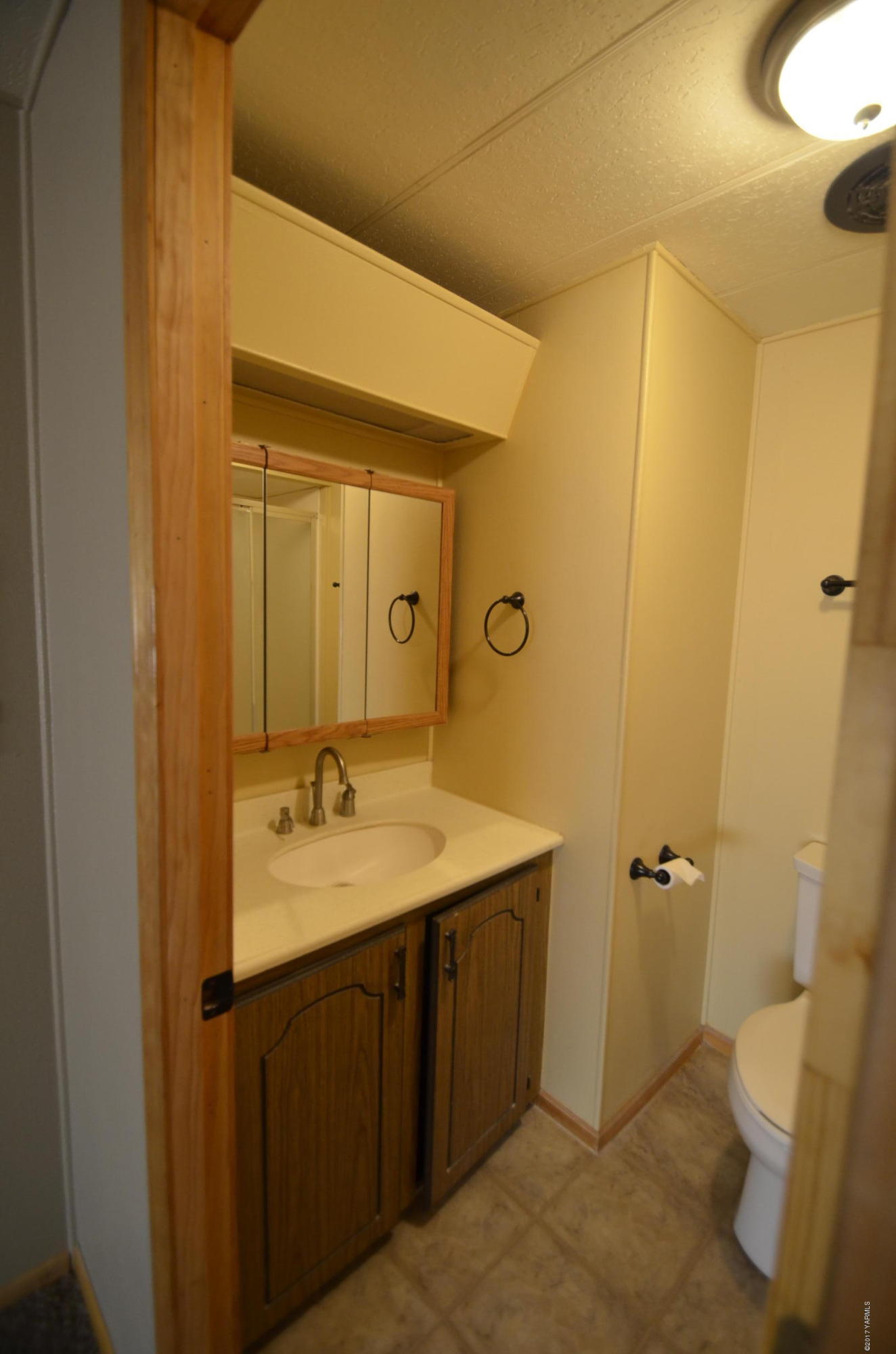 13206 Summitview Ext Road Yakima, WA 98908 - Photo 14 of 29 a bathroom with a granite countertop sink toilet and shower