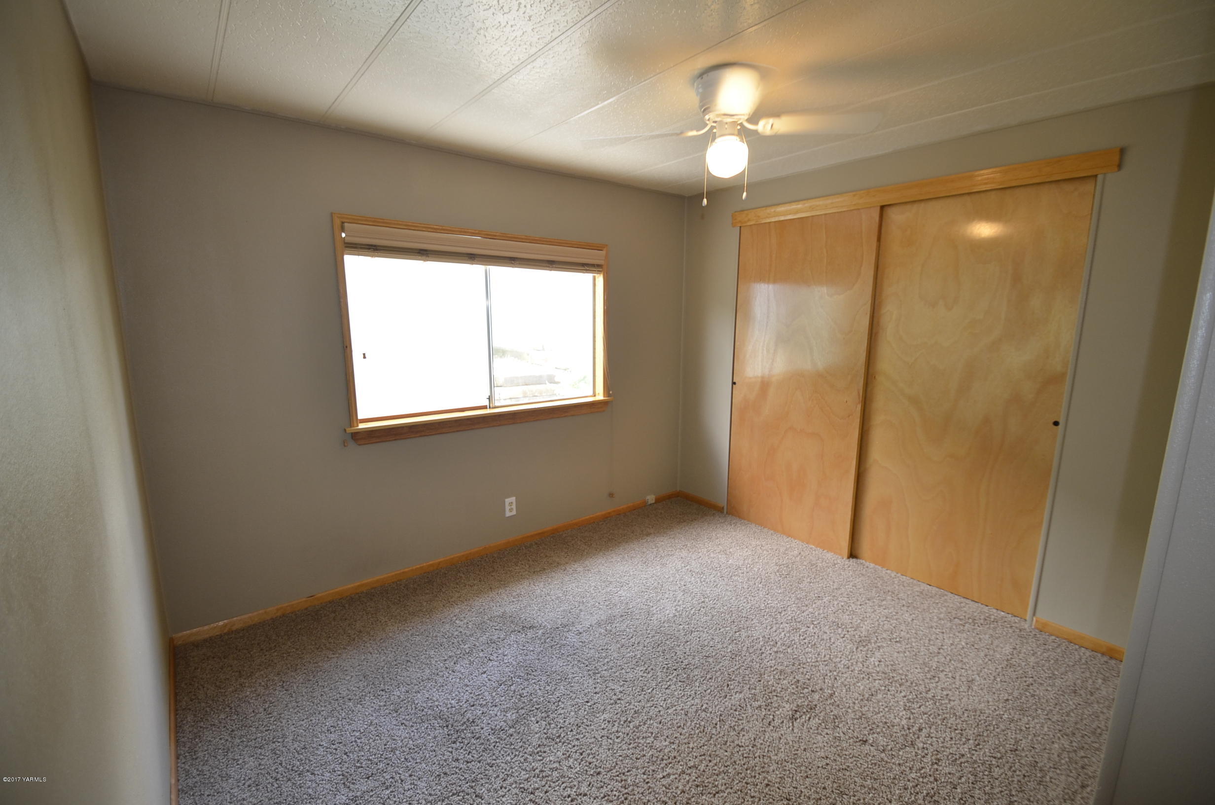 13206 Summitview Ext Road Yakima, WA 98908 - Photo 15 of 29 a view of an empty room with a window