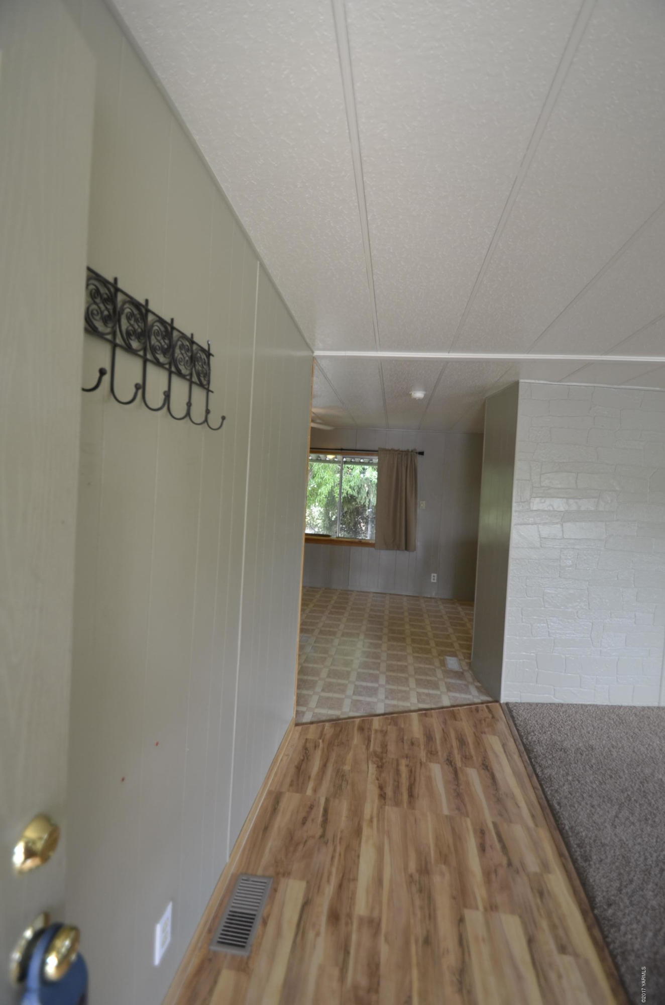 13206 Summitview Ext Road Yakima, WA 98908 - Photo 3 of 29 a view of a hallway with wooden floor