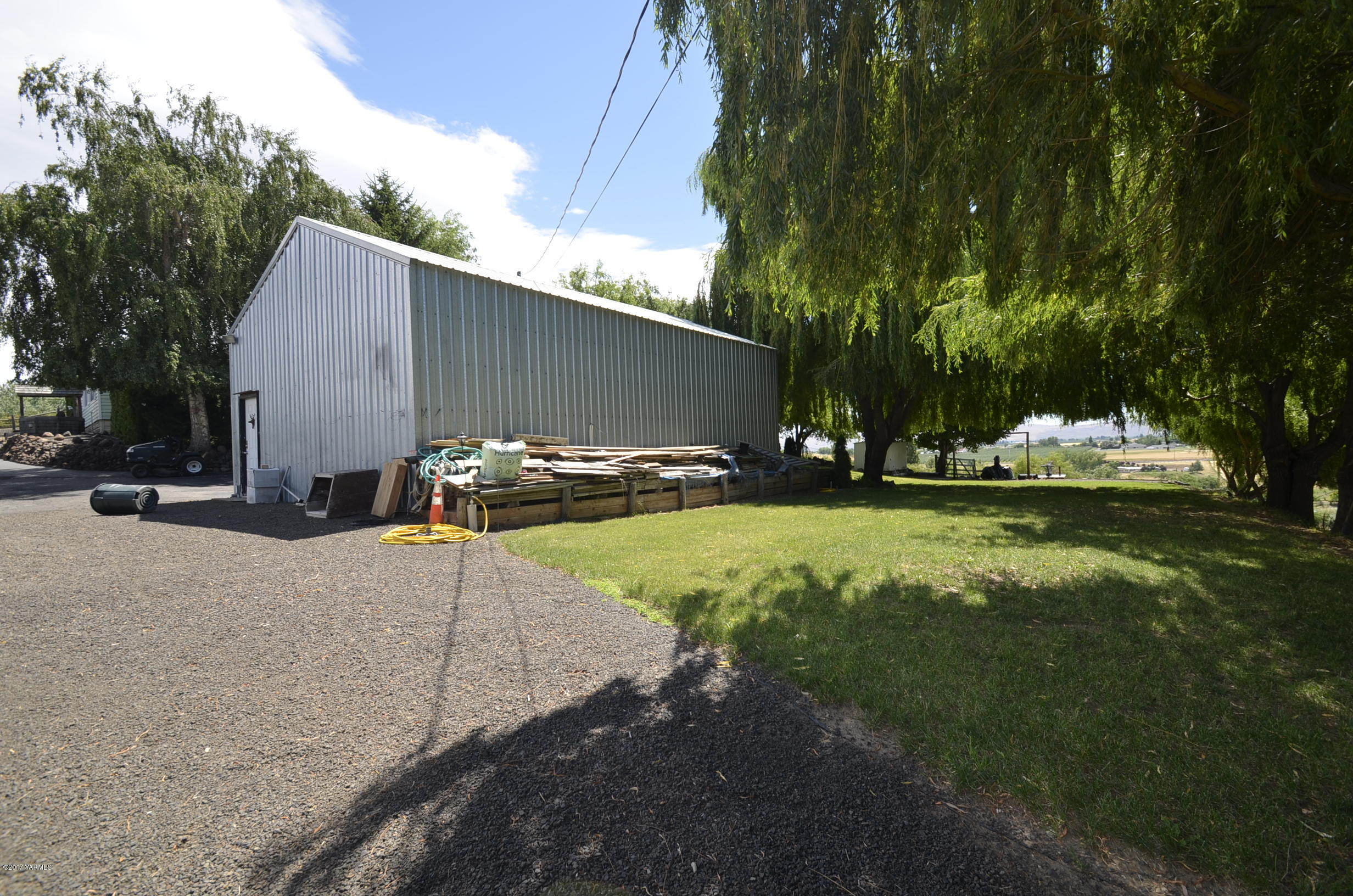 13206 Summitview Ext Road Yakima, WA 98908 - Photo 27 of 29 a view of a backyard with swimming pool