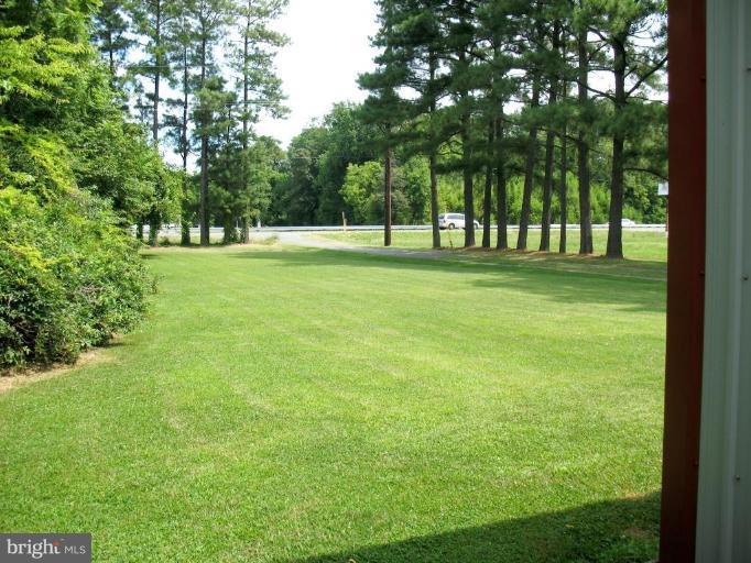 3116 Aireys Road Cambridge, MD 21613 - Photo 19 of 20 Back yard fronting on Rt. 50