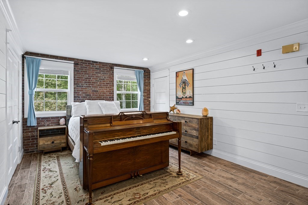 39 Liberty Square Road, Unit D Boxborough, MA 01719 - Photo 14 of 26 a view of a workspace with furniture and a window