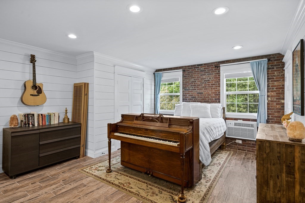 39 Liberty Square Road, Unit D Boxborough, MA 01719 - Photo 15 of 26 a bed room with a bed and a window