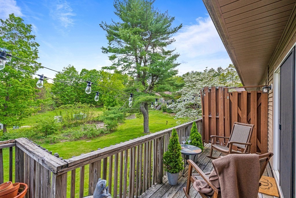 39 Liberty Square Road, Unit D Boxborough, MA 01719 - Photo 18 of 26 a view of a two chairs on the roof deck