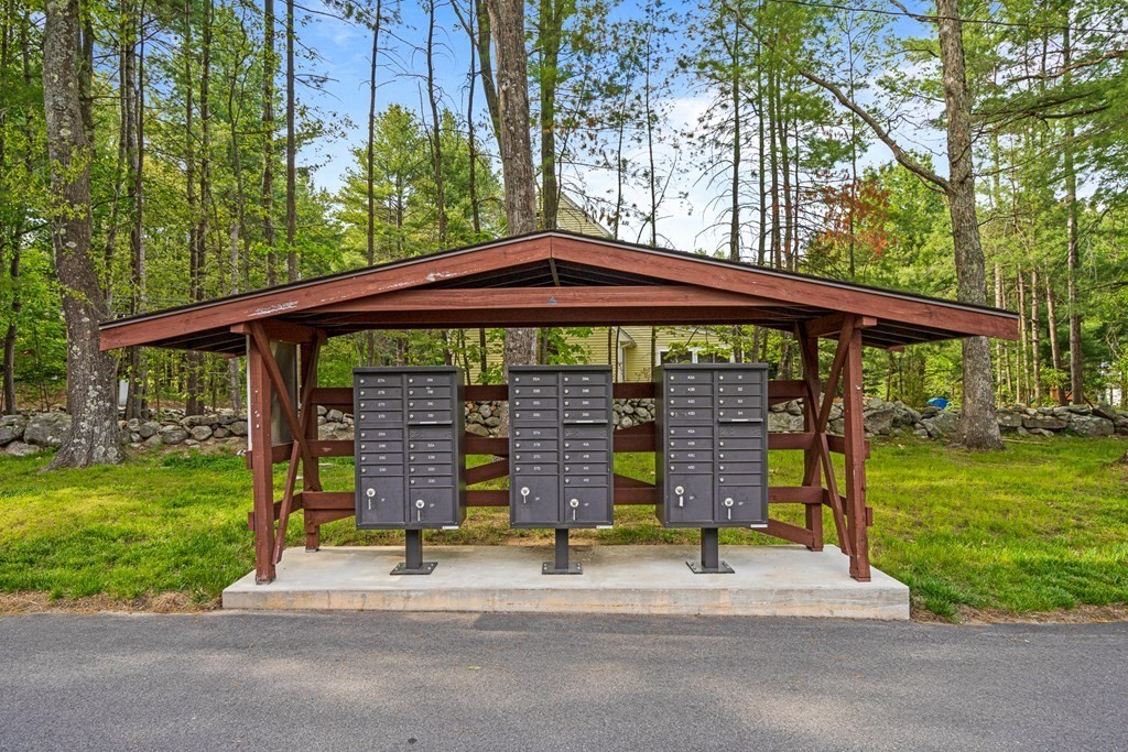 39 Liberty Square Road, Unit D Boxborough, MA 01719 - Photo 23 of 26 a view of a patio with a yard