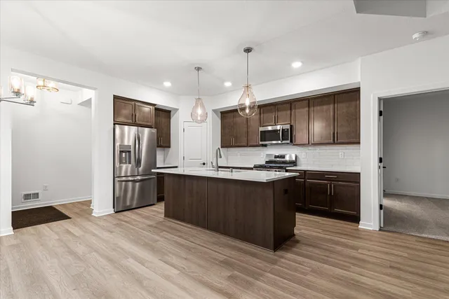 $459,900 | W204N17695 Laurel Place, Unit 702, Jackson, WI 53037