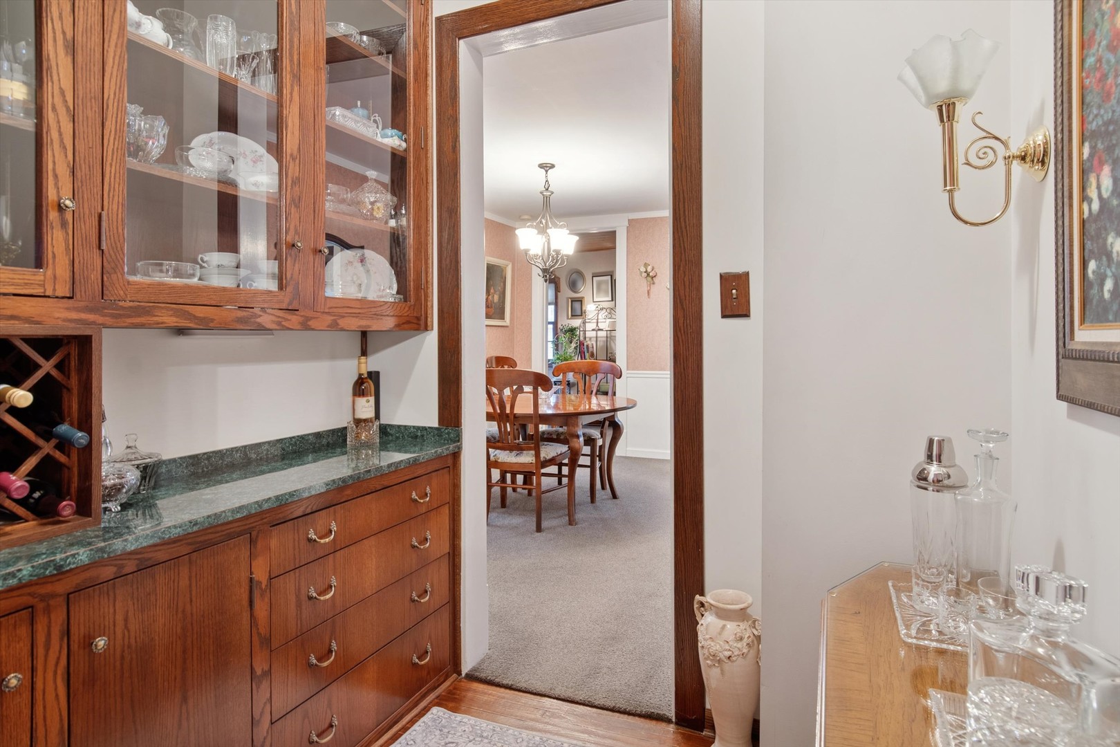 628 East Main Street Morris, IL 60450 - Photo 12 of 32 a bathroom with a granite countertop sink and a mirror