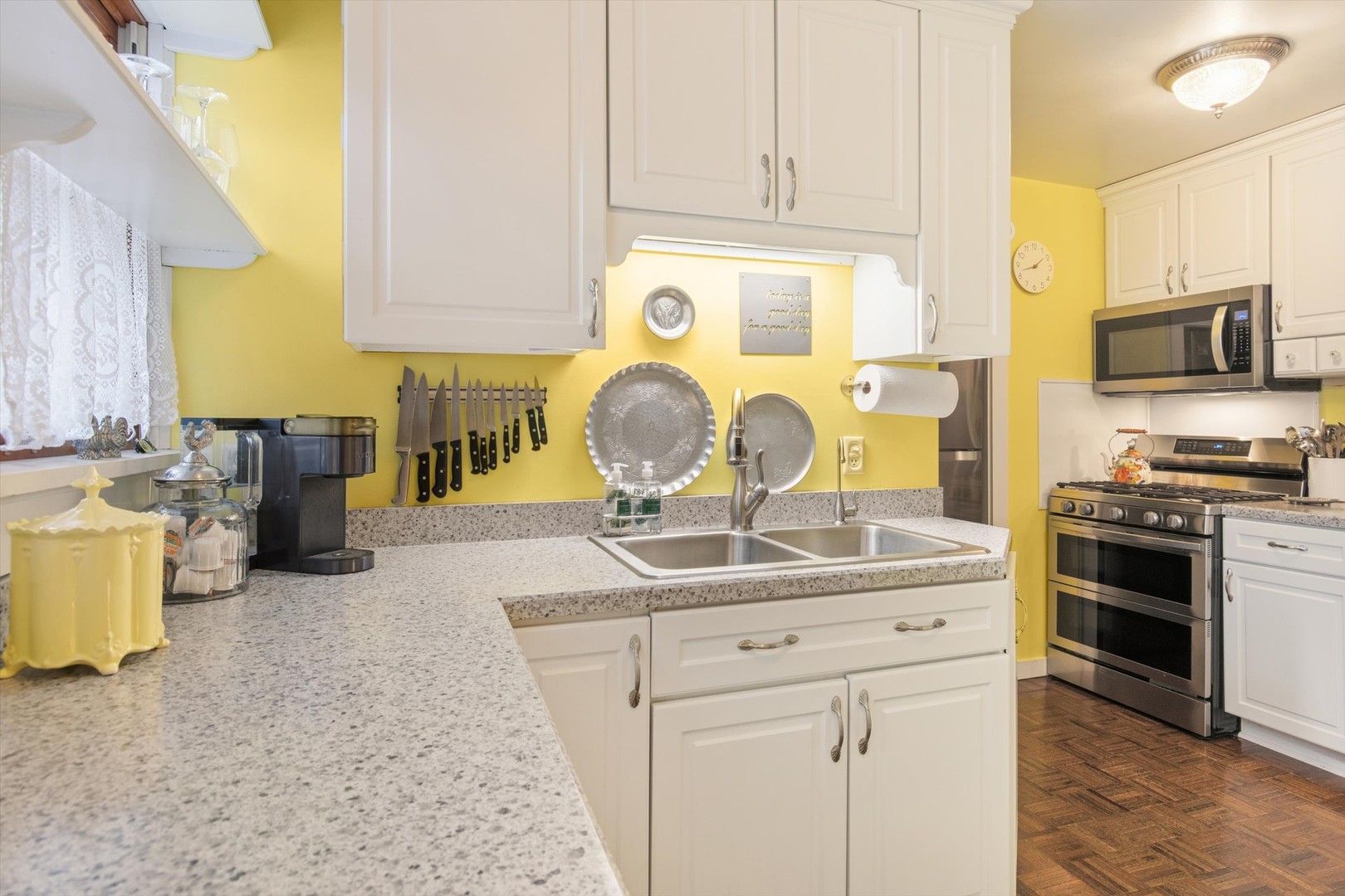 628 East Main Street Morris, IL 60450 - Photo 16 of 32 a kitchen with kitchen island granite countertop a sink and a stove