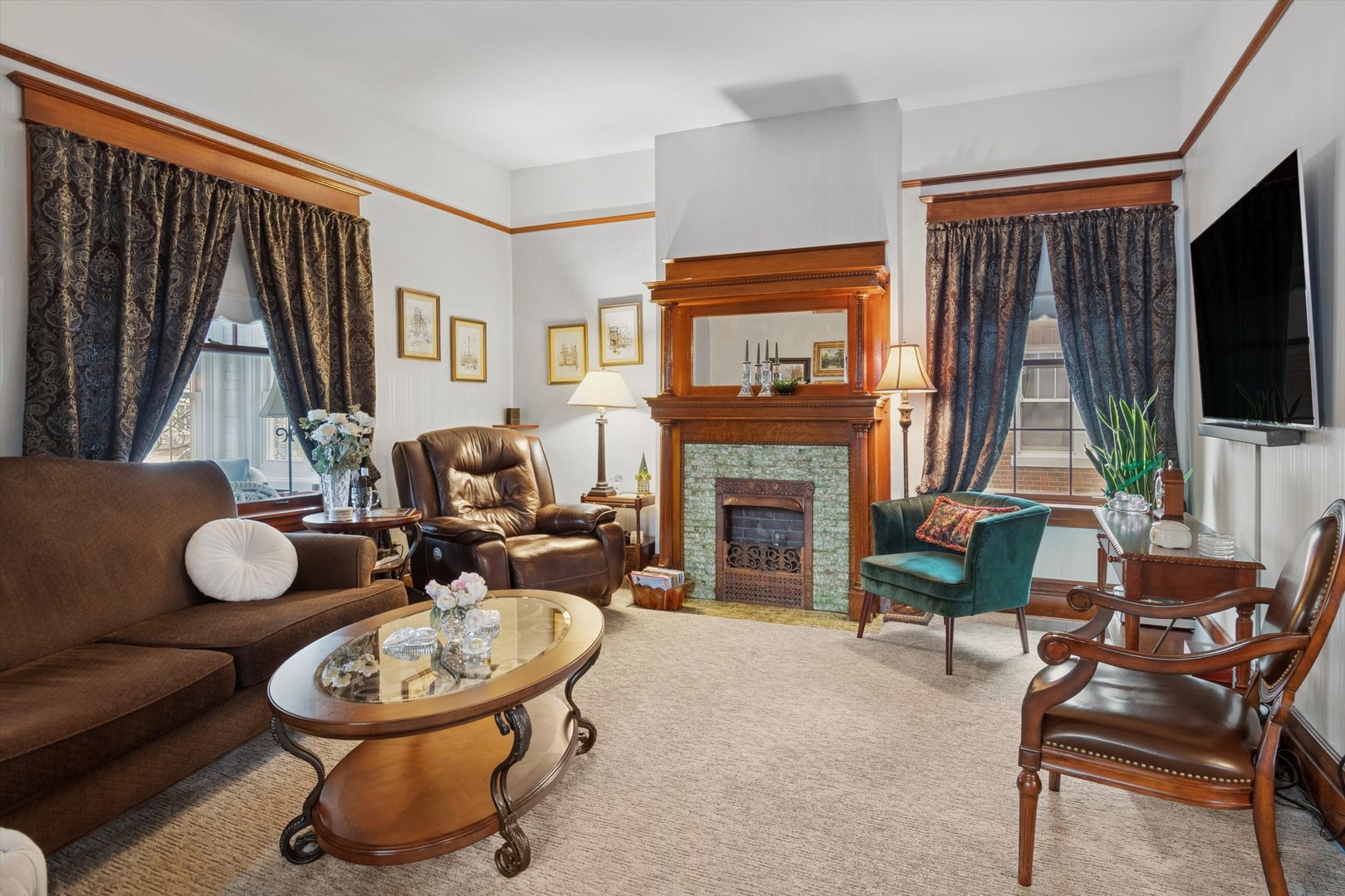628 East Main Street Morris, IL 60450 - Photo 5 of 32 a living room with furniture a fireplace and a flat screen tv