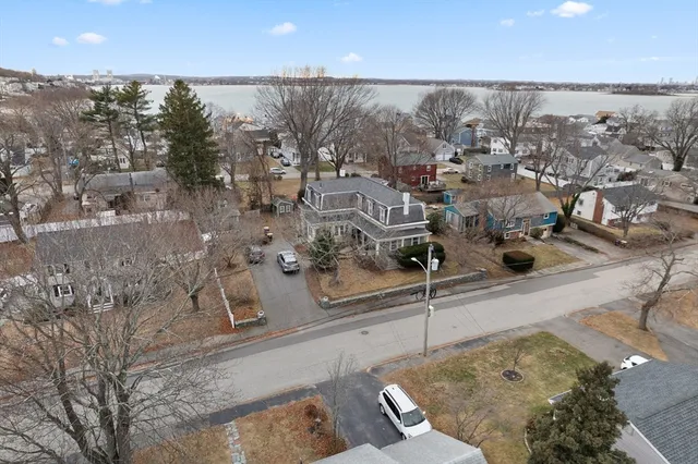 a hallway with granite countertop wooden floors